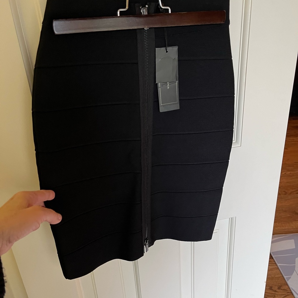BCBG NWT Black “Josey” bandage skirt with full zip front detail.
